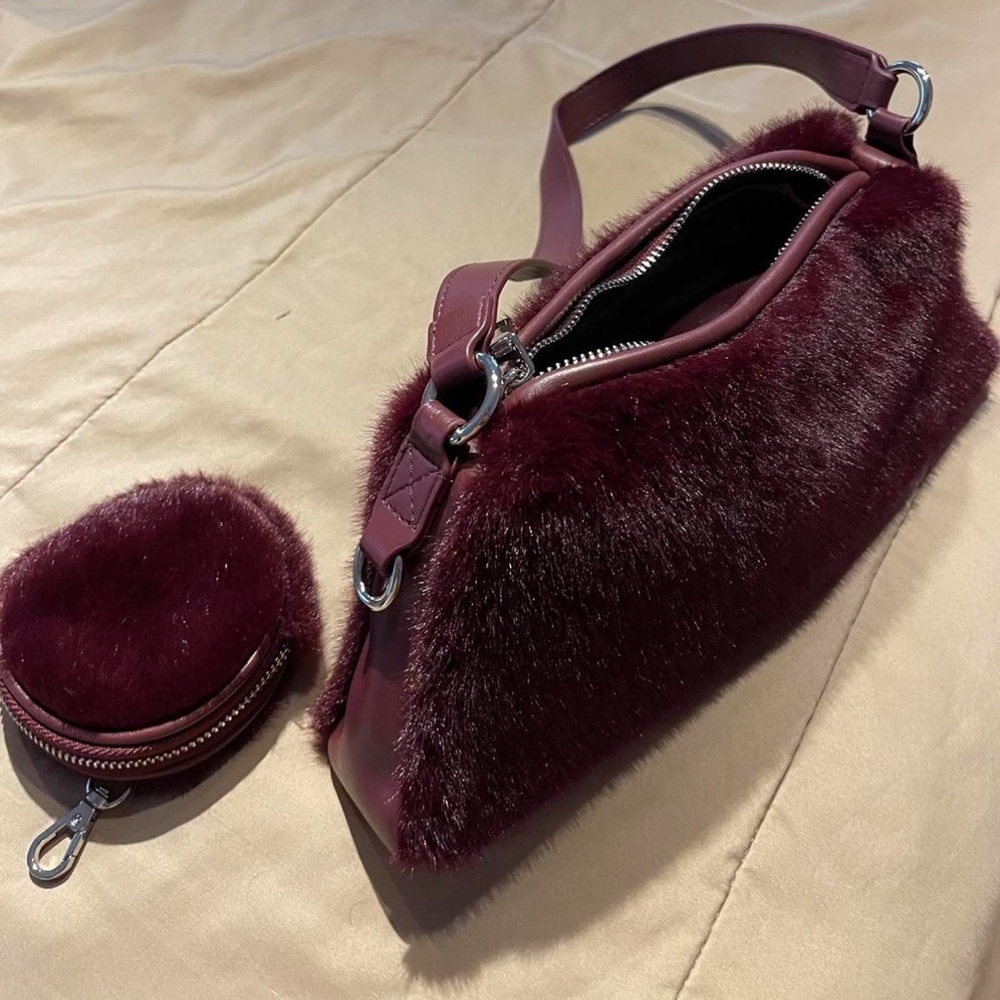 Burgundy faux fur shoulder bag with matching pouch, minor creasing in interior